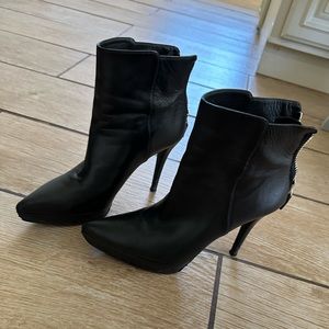 Black designer high heel boots